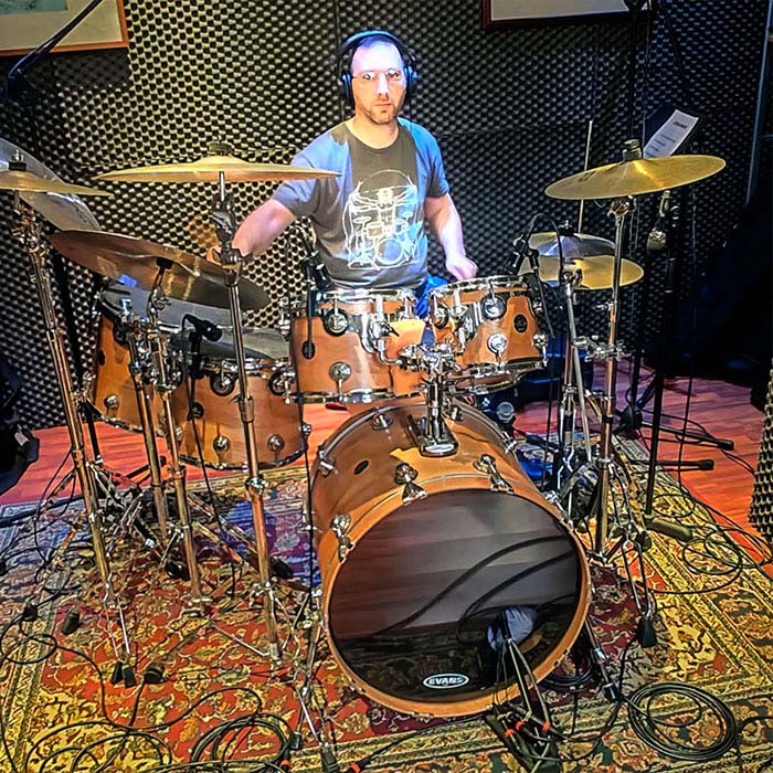 Inizia in tenera età a suonare da autodidatta la batteria; inizieranno i veri studi negli anni 90, con il maestro Sessarego nella Filamornica di Cornigliano, con la quale suonerà anche nell’orchestra del Carlo Felice le percussioni; nel stesso periodo inizia a suonare con svariate band tra cui gli Oniria e gli A-live con i quali vince il concorso dell’Heineken e registra il suo primo cd.